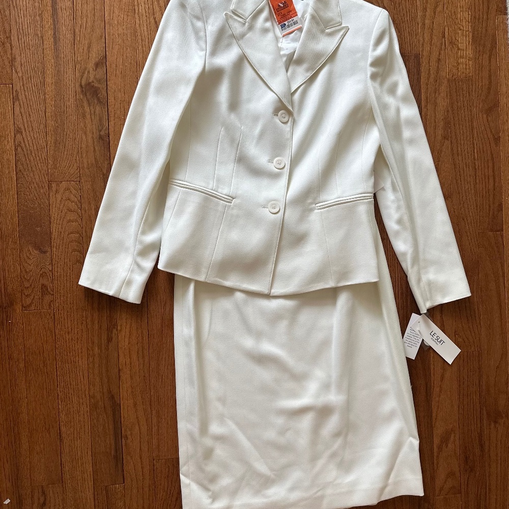 Two piece cream skirt suit